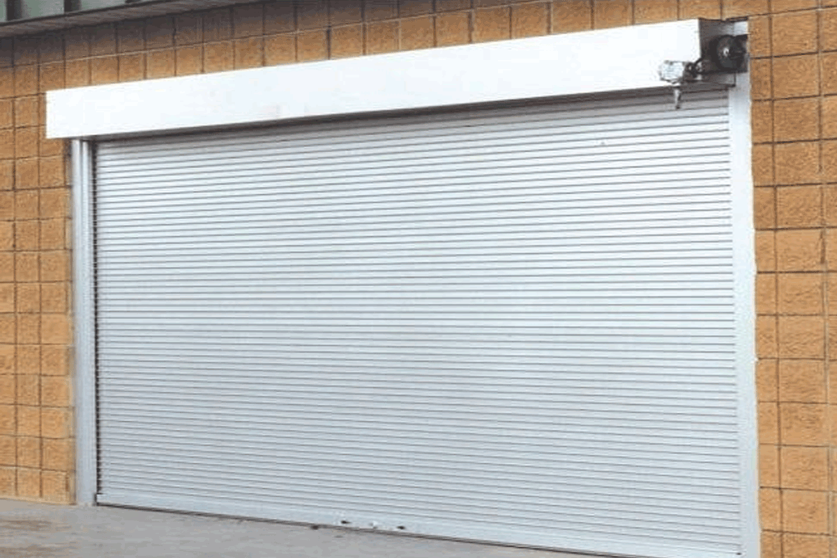 Aluminium Sleeves Type Polycarbonate Shutter installed at a retail storefront
